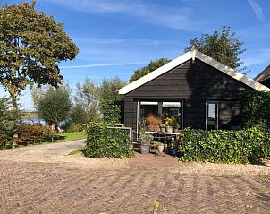 Buitenkant van Huisje in Brandwijk, een charmant vakantiehuis in de Alblasserwaard, Zuid-Holland.