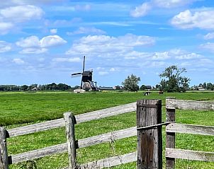 Prachtig uitzicht op de molen vanuit Vakantiehuisje in Streefkerk, Alblasserwaard.