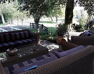 Cozy terrace overlooking nature at vacation home Stolwijk, Alblasserwaard, South Holland.