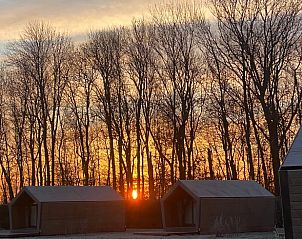 Breathtaking sunset at Cottage in Sommeldsijk, located in the serene surroundings of Sommelsdijk, Goeree-Overflakkee.