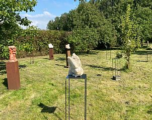 Sculpture Garden at Cottage in Sommeldsijk, a unique vacation experience in Sommelsdijk, Goeree-Overflakkee with art and nature.