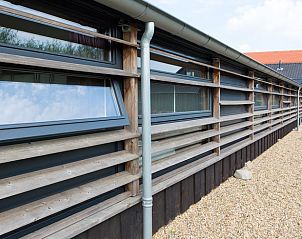 Exterieur van Vakantiehuisje in Noordeloos, Groene hart, Zuid-Holland met unieke houten gevel.