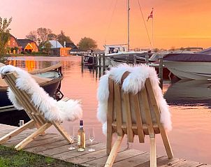 Romantische zonsondergang bij Huisje in Oud Ade, vakantiehuis aan het water, Zuid-Holland.