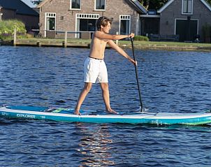 Suppen op het water bij Huisje in Oud Ade, vakantiehuis, Zuid-Holland.