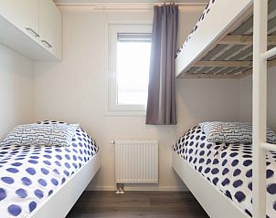 Gezellige kinderkamer met stapelbed in vakantiehuis Duinparel 126, Noordwijk aan de Noordzeekust.