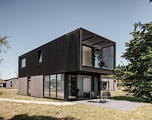 Moderne vakantiehuis Sunset 6 in Zwartewaal, Zuid-Holland met terras en omringd door natuur op Voorne Putten/Hoekse Waard.